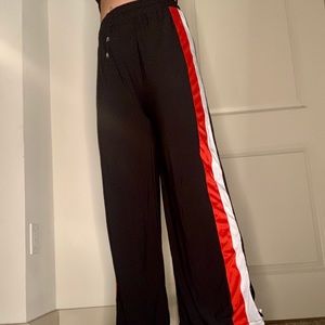 Black soft pants with red/white stripe